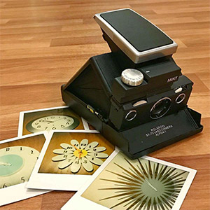 Polaroid SLR670-S Film camera and photos