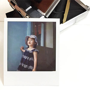 SLR670-X Vintage Polaroid Camera and photos